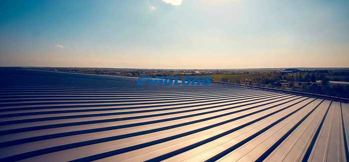 Steel building roofing system with purlins and insulated metal sheets